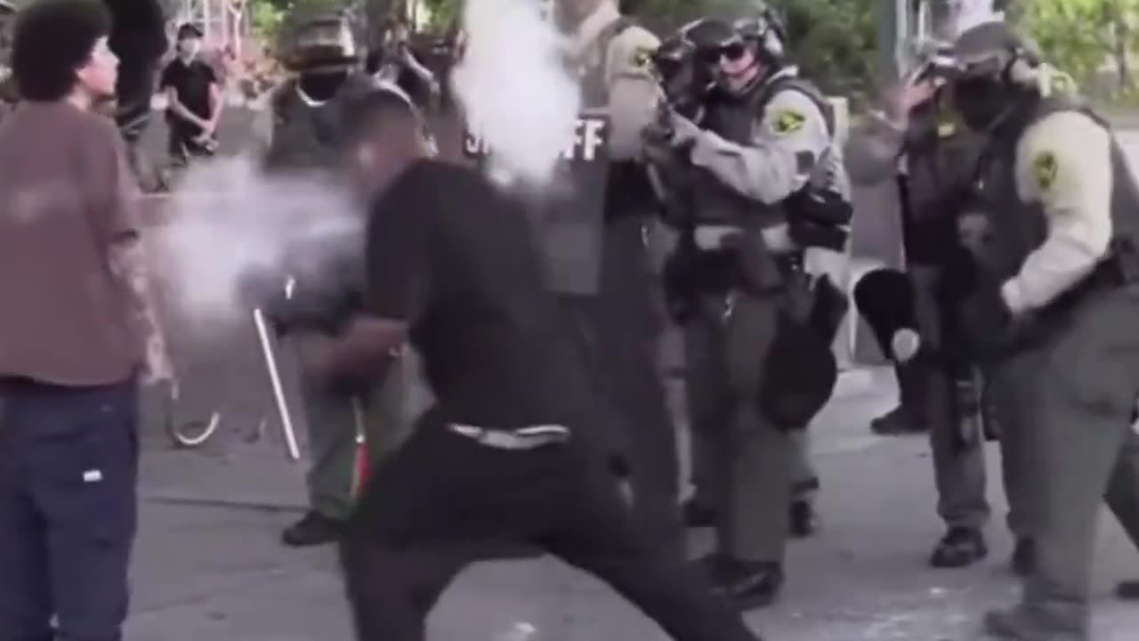 White warrior SLAMS rioter