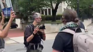 Pro-Palestinians surround the vehicle of an elderly man in DC and begin violently harassing him