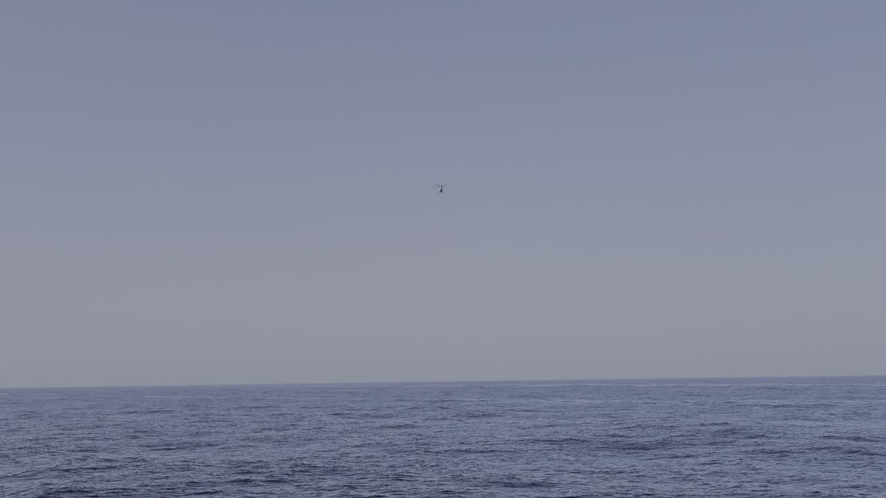 Helo taking off from platform