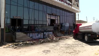 Fire leaves dozens dead as it sweeps through Iraqi mall