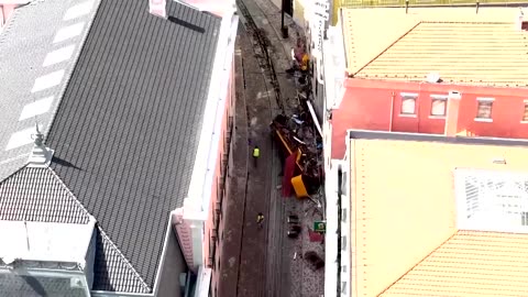Aerial footage shows mangled Lisbon funicular after deadly crash