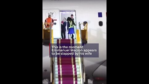 Macrons male wife shoves him by the face on live TV