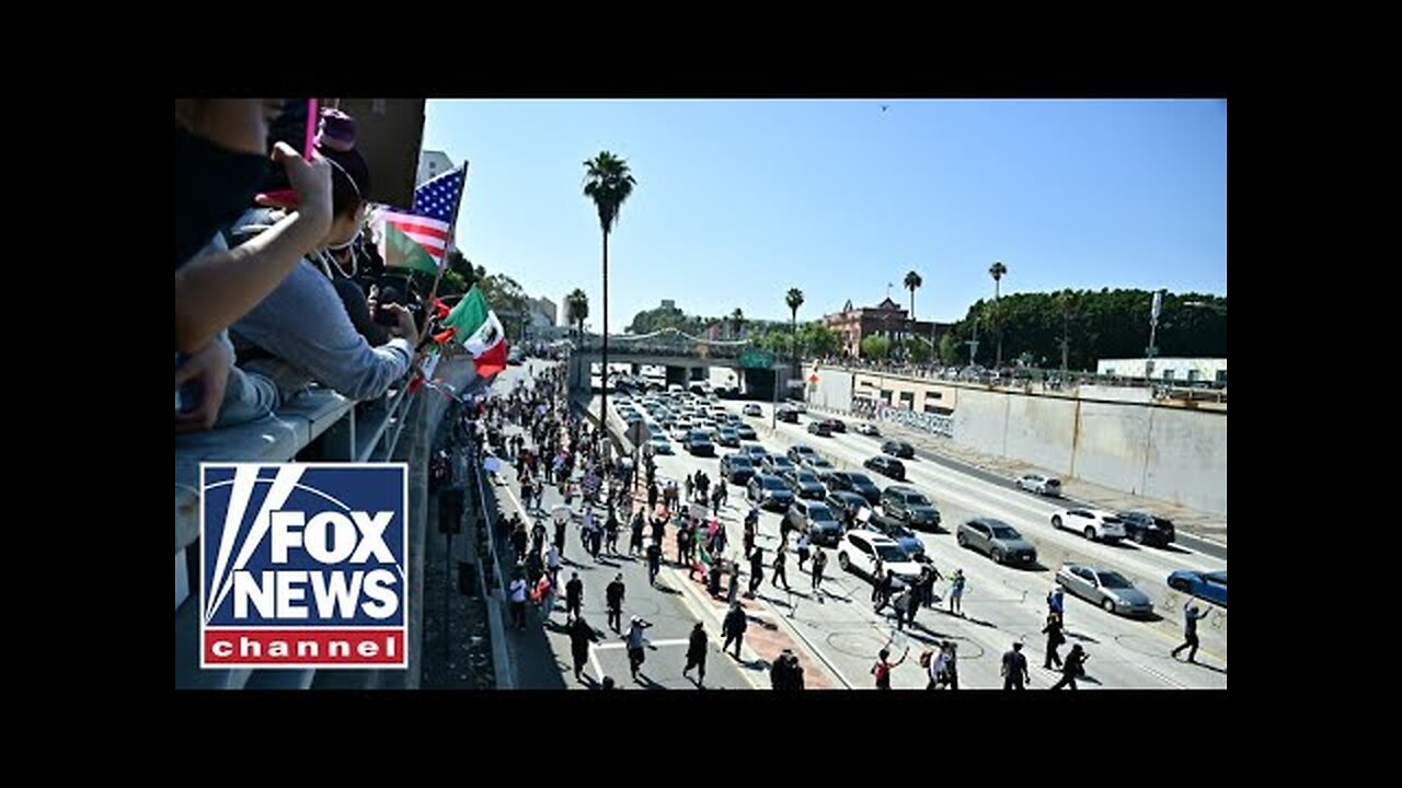 FREEWAY TAKEOVER - Los Angeles rioters take to major highway