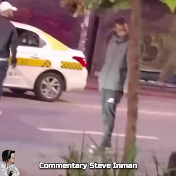 Man blocks road, man gets his block knocked