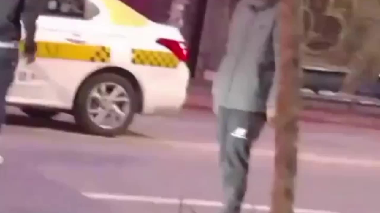 Man blocks road, man gets his block knocked