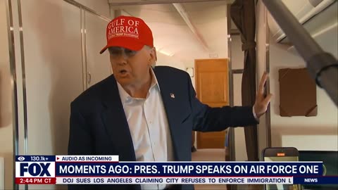 President Donald Trump spoke to reporters aboard AF1