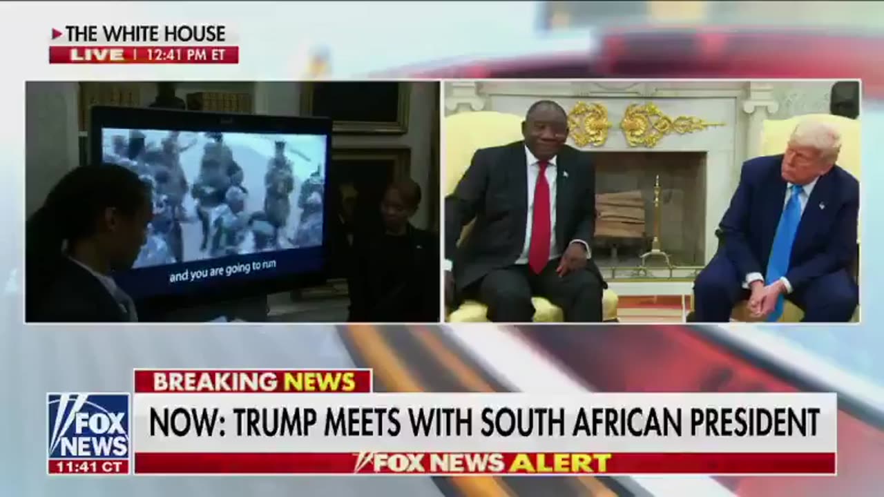 Trump brings a TV in front of the South African President, shows his government calling for genocide