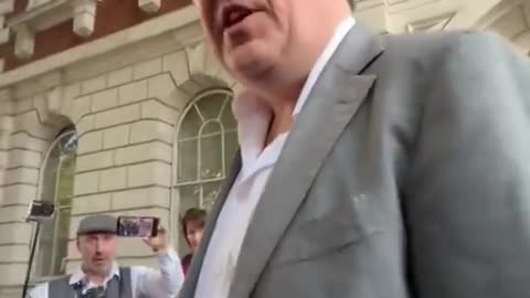 Graham Linehan responds outside of court