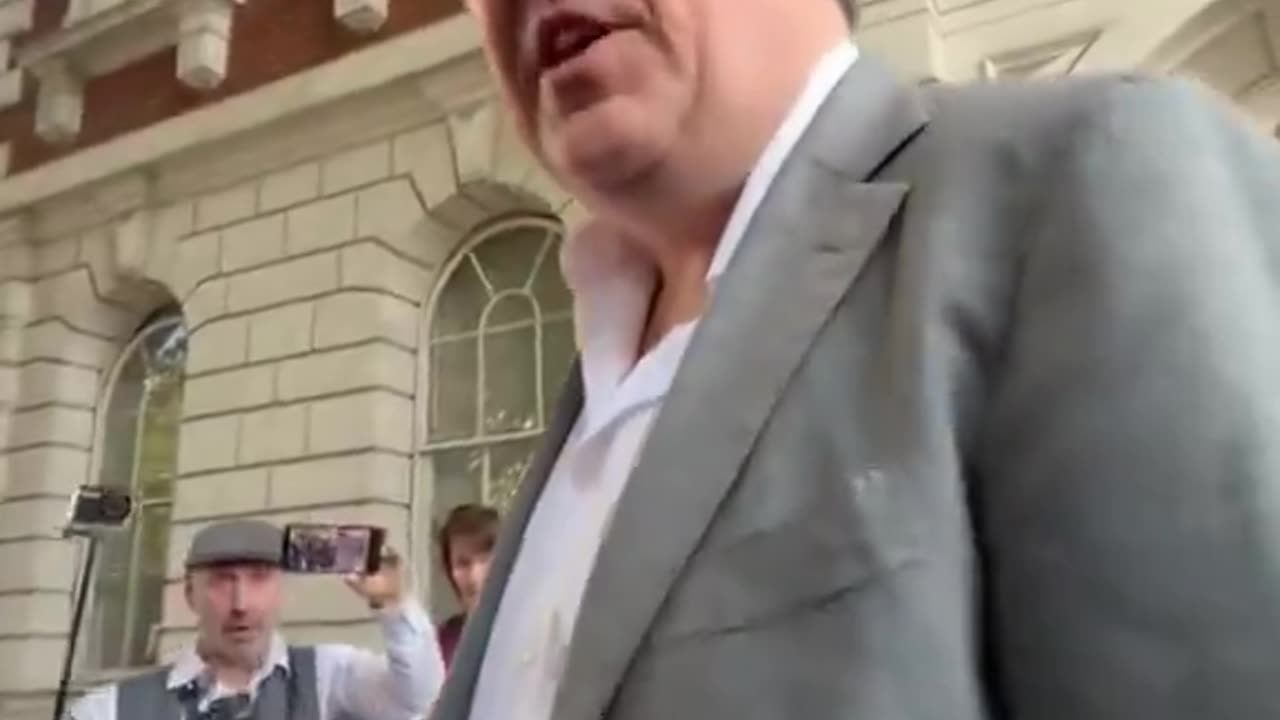 Graham Linehan responds outside of court