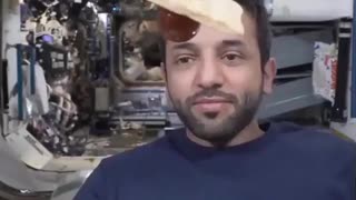 Astronaut eating bread and honey in space