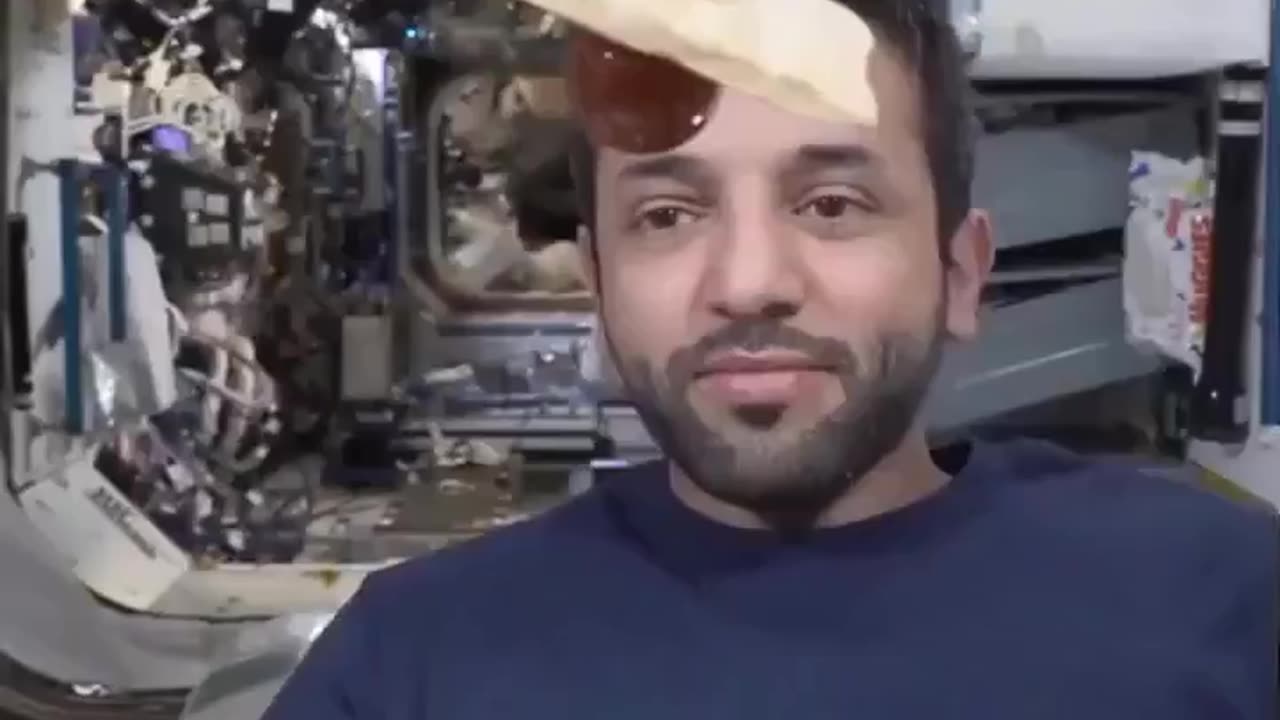Astronaut eating bread and honey in space