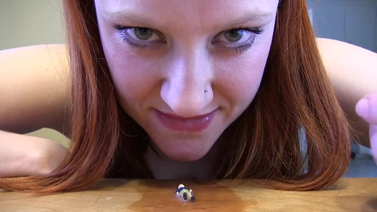 Redhead Giantess VORE a tiny man - Giant Woman eat a toy
