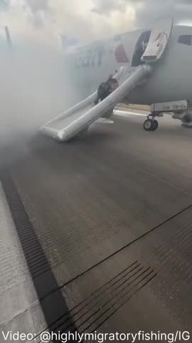 American Airlines plane evacuated on tarmac in Denver after wheel catches fire.