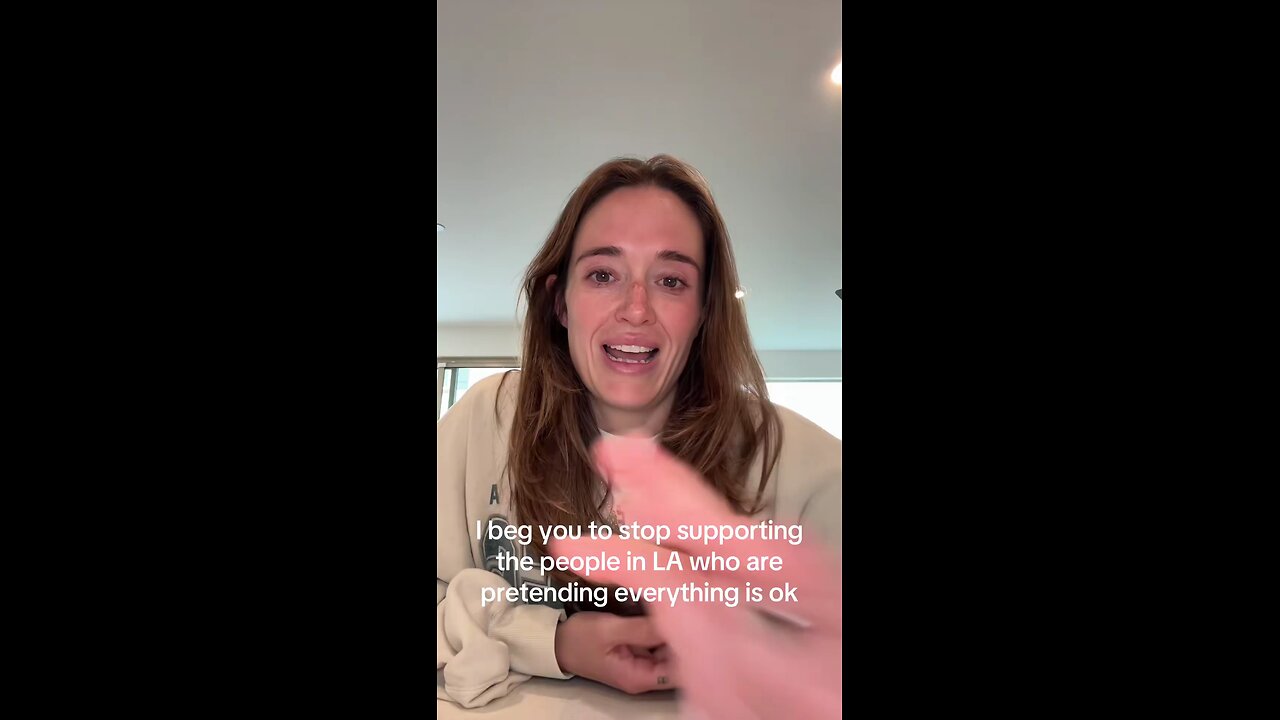 White liberal woman has an emotional breakdown when she notices that nobody's pausing for ICE raid