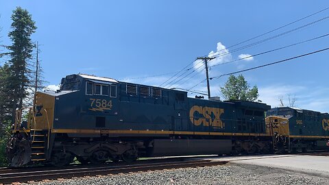CSX Trains 7584 and 5492 head East