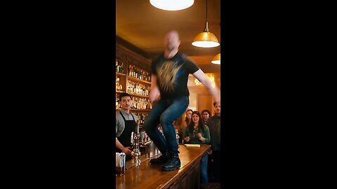 Russell Blade jumps off a bartender's table and drop kicks a black mask wrestler at a bar