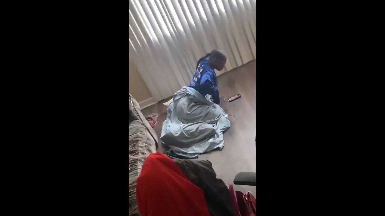 WHAT IS SHE DOING?