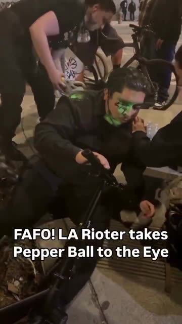Close up video shows the aftermath of a protester that was shot in the face with a pepper ball