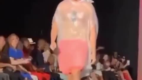 This man simply walked into the fashion show wearing a garbage bag