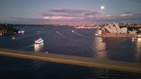 Thoughts on how full moon above Sydney Opera House echoed giant Q on one of its sails