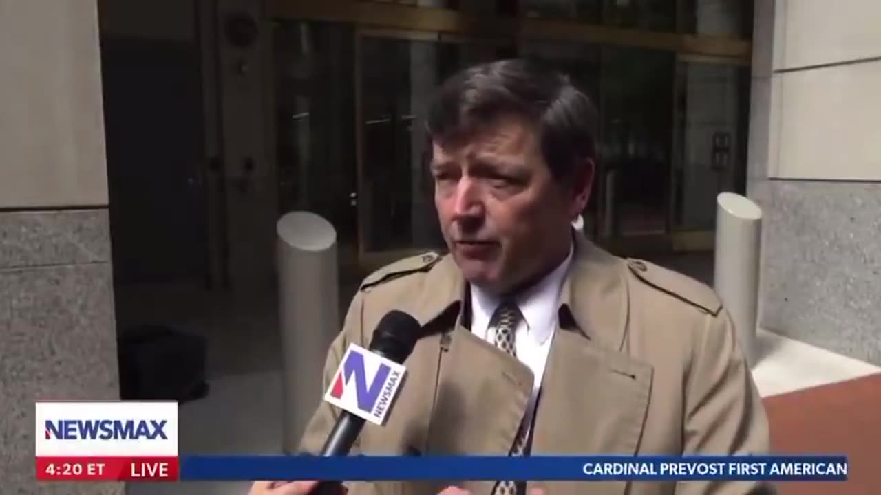 An arrest warrant has been issued for the woman who spat on U.S. Attorney Ed Martin