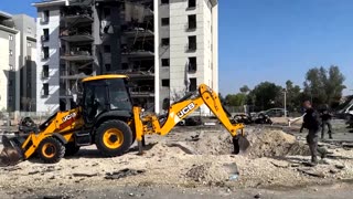 Iranian missile causes crater and damages buildings in Israel