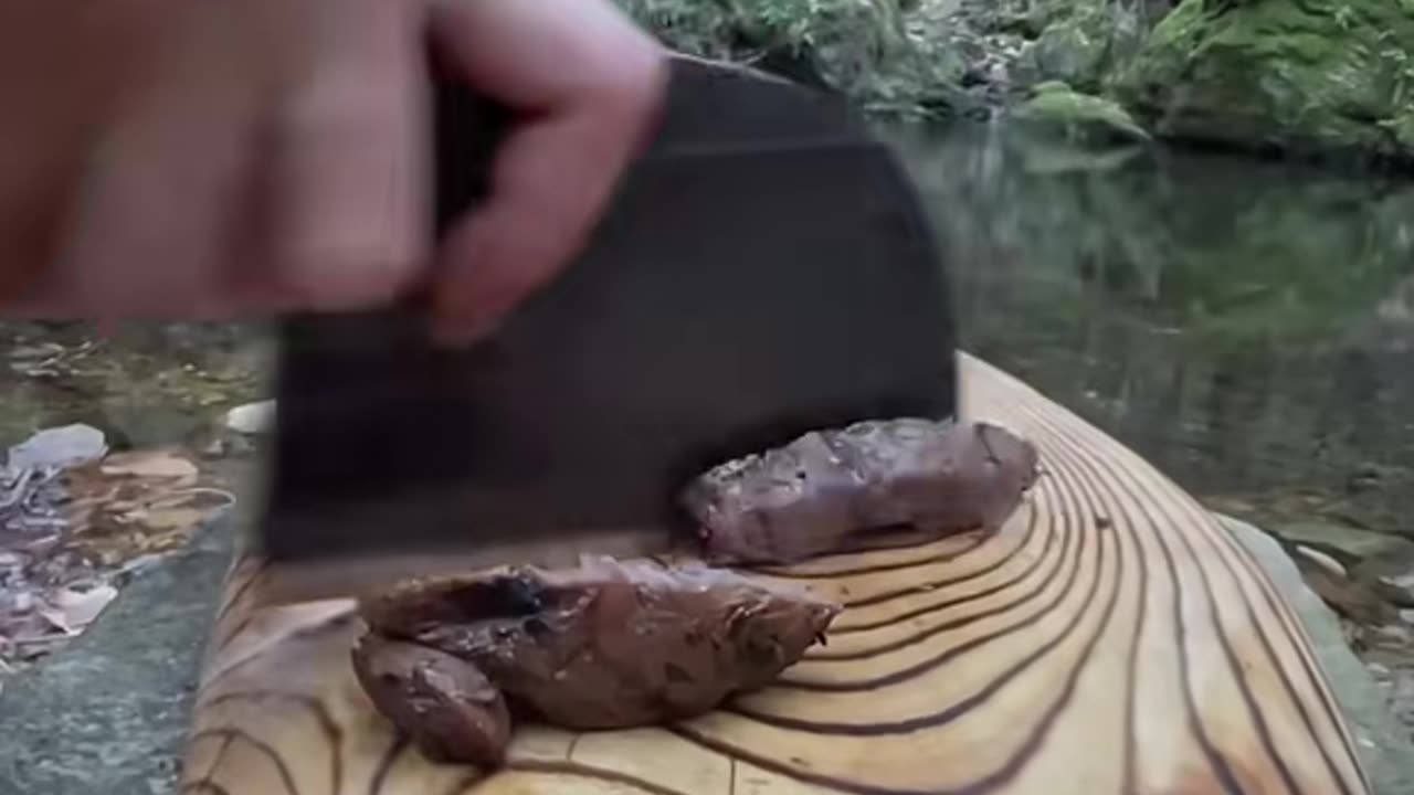 Veal pearls grilled in the primitive way in the forest