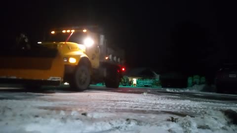 Snow plowing church parking lot with a international 4700