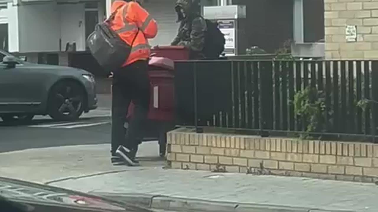 2 men stealing peoples mails parcels from royal mail box.
