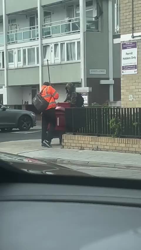 2 men stealing peoples mails parcels from royal mail box.
