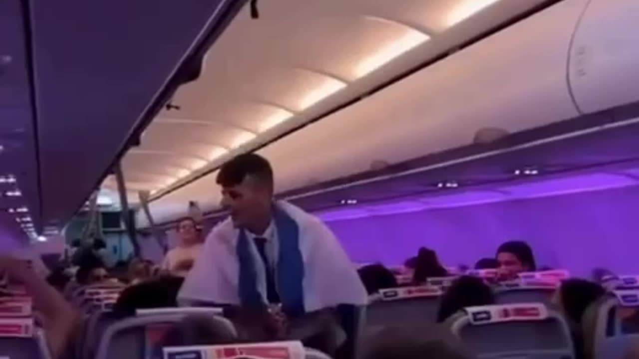 One flight attendant bursts into a joyful dance