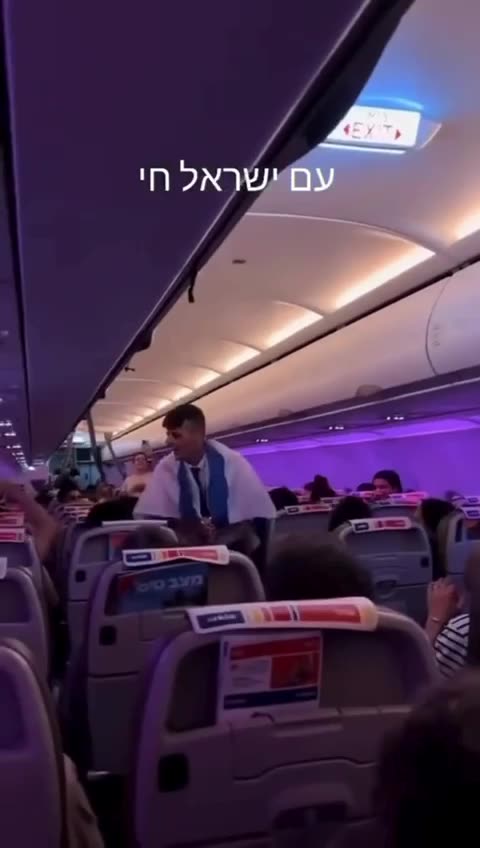 One flight attendant bursts into a joyful dance