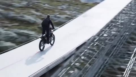 Tom Cruise rode a motorcycle off a cliff six times in one day… for a single movie scene.