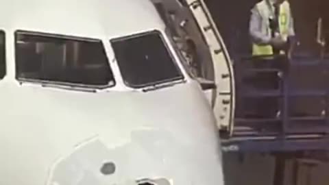 A plane flies through a hailstorm... impressive