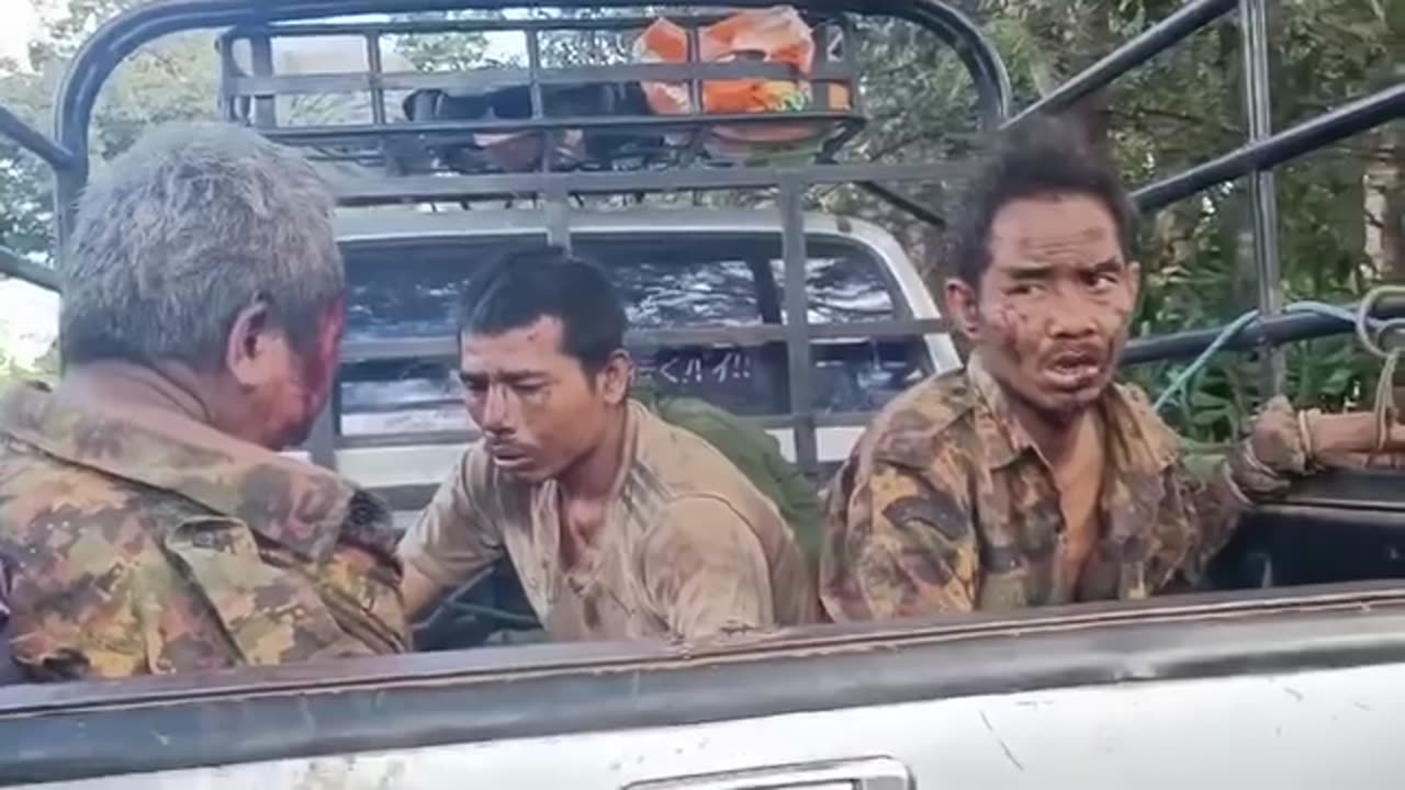 Soldiers with white flags shining from the bullet holes