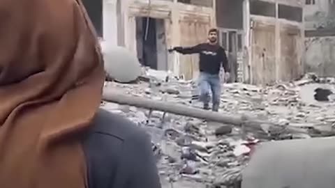 Gaza woman leaves home for flour, returns to find family buried under rubble