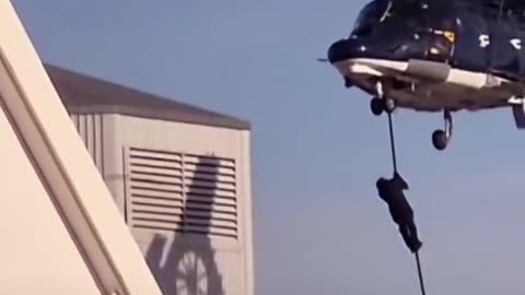 Mask figures drop from helicopter near Manchester Tescos