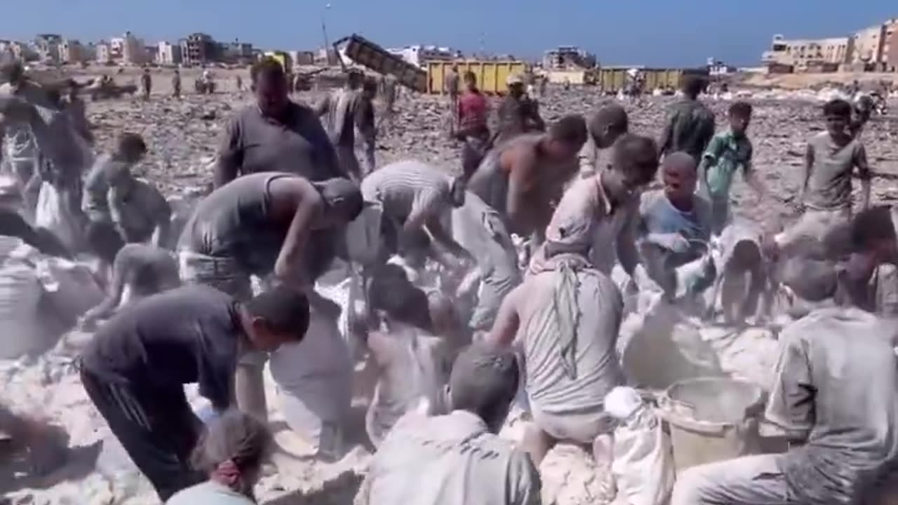 Gaza: Starving civilians now scrape flour mixed with sand to survive.