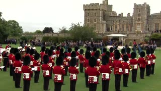 Trump watches military ceremony on second Britain state visit