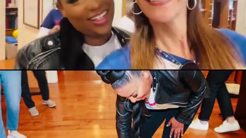 Radio show host Stephanie Miller kisses the feet of Democrat Rep. Jasmine Crockett.