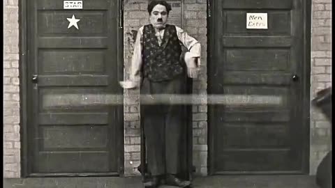 Charlie Chaplin hits two dudes