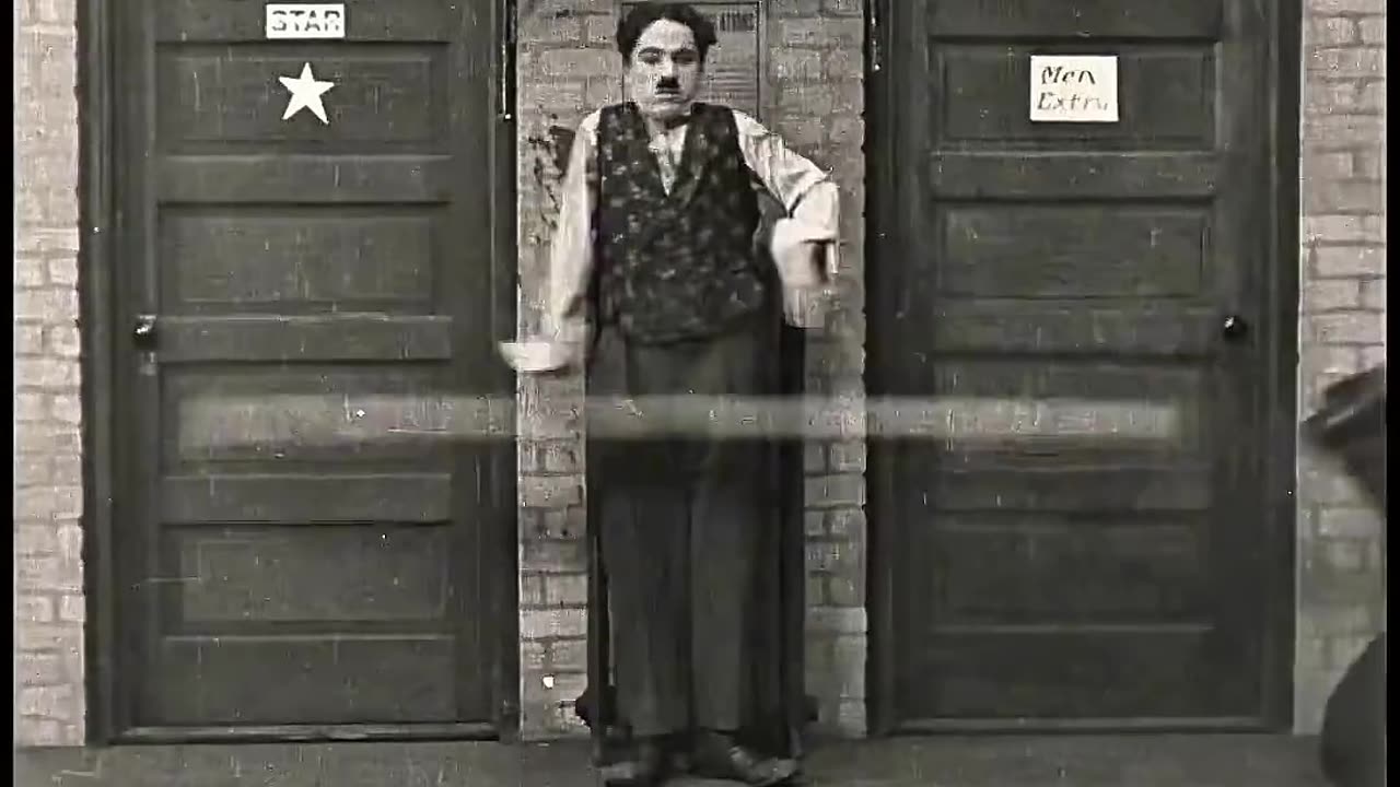 Charlie Chaplin hits two dudes