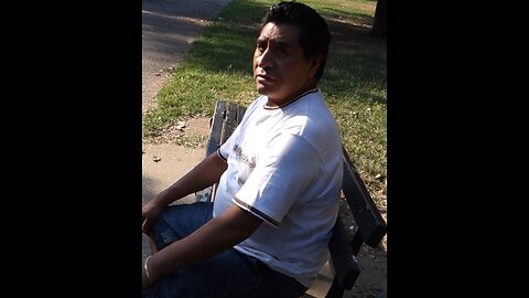 Luodong Massages Mexican Man's Shoulder On The Park Bench