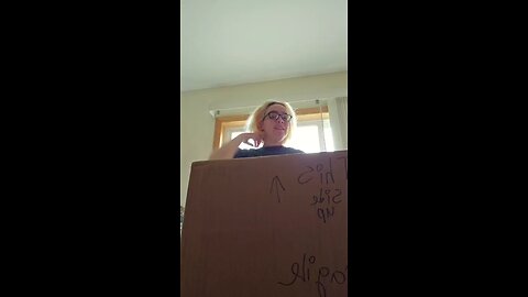 Opening a gift from Hannah McAfee!