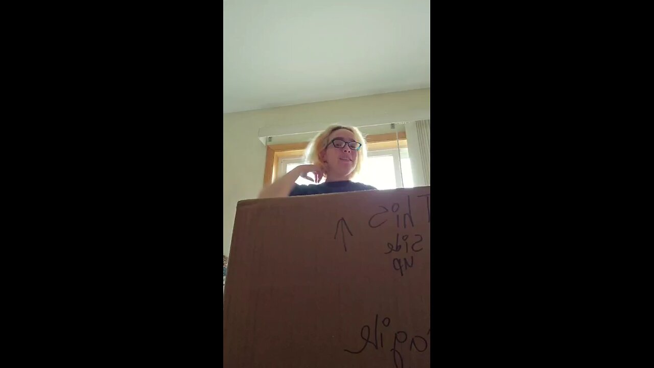 Opening a gift from Hannah McAfee!