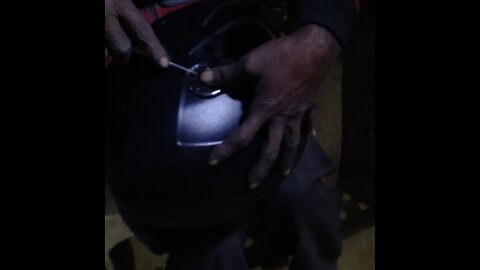 expertise in action as they restore safety and style. #HelmetFix #MechanicSkills