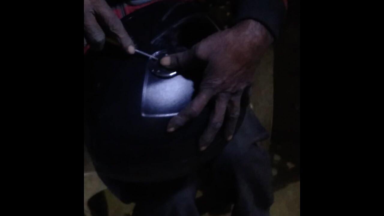 expertise in action as they restore safety and style. #HelmetFix #MechanicSkills