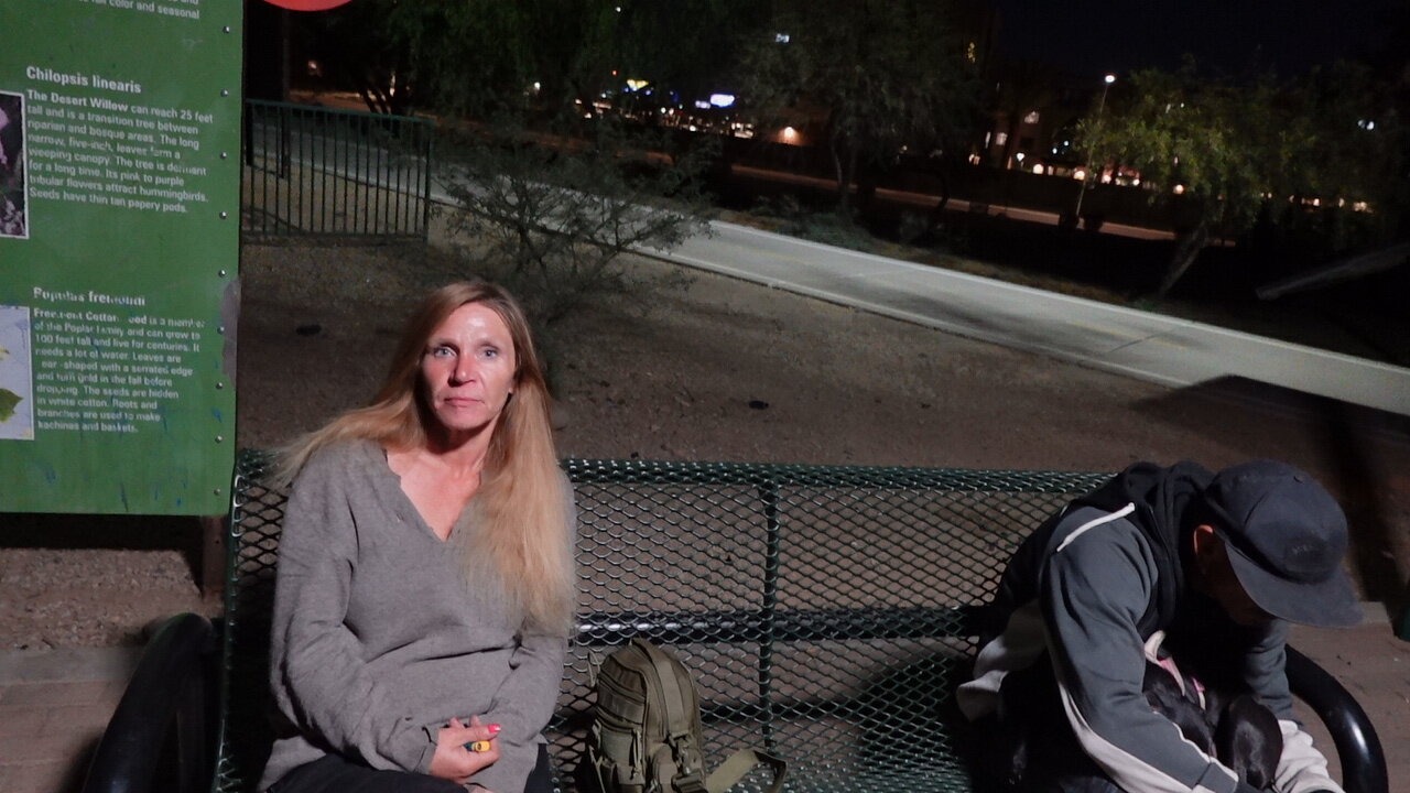 Shelby, 49, homeless and on probation, must report her park bench sleeping location nightly.