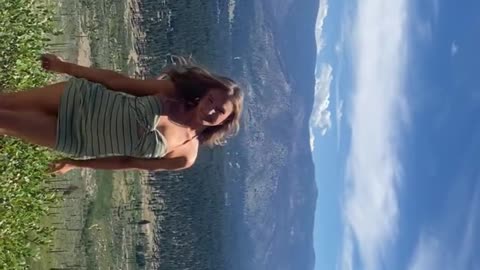 trans woman enchanted with the mountain