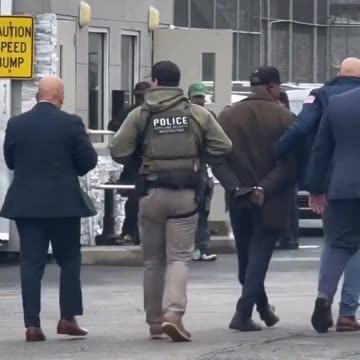 Here's Mayor Ras Baraka's cuffed walk of shame